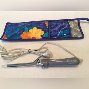 Vidal Sassoon 1/2” curling iron, 2 heat settings and insulated storage case.